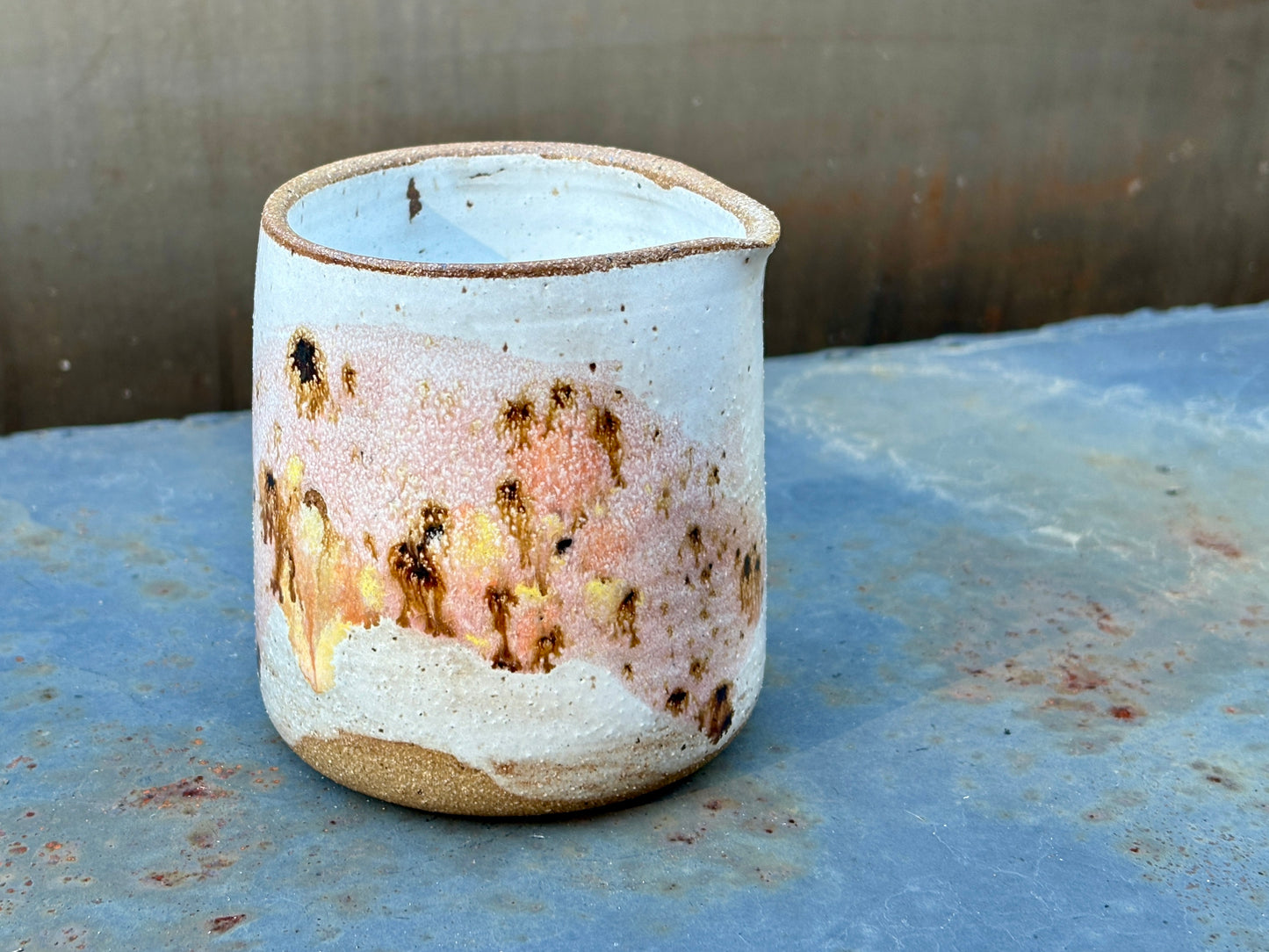 Speckled white creamer- Guava splash and raw rim