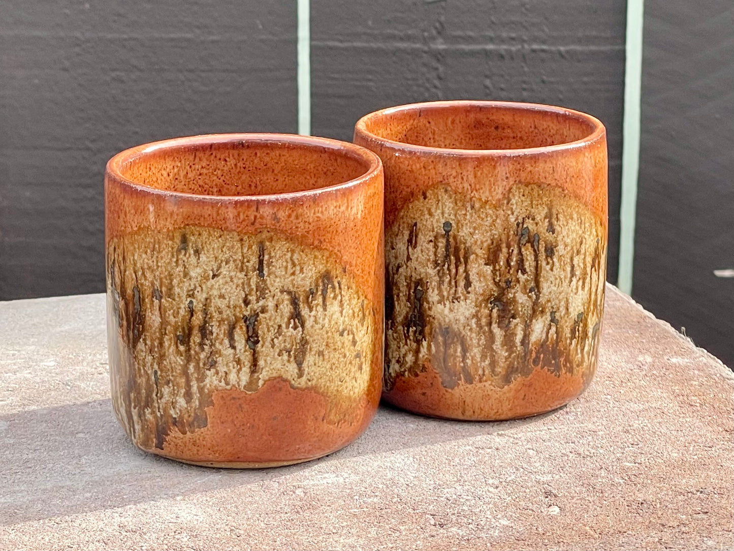 Brown swoosh cup