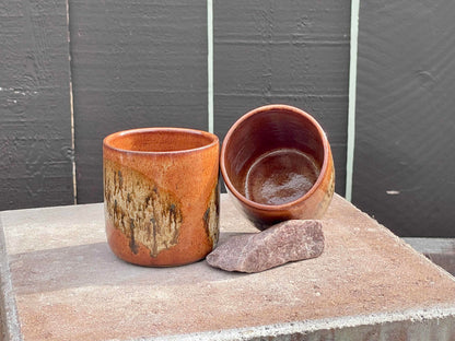 Brown swoosh cup