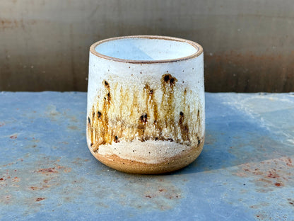 Speckled white cup- raw rim