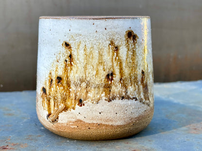 Speckled white cup- raw rim