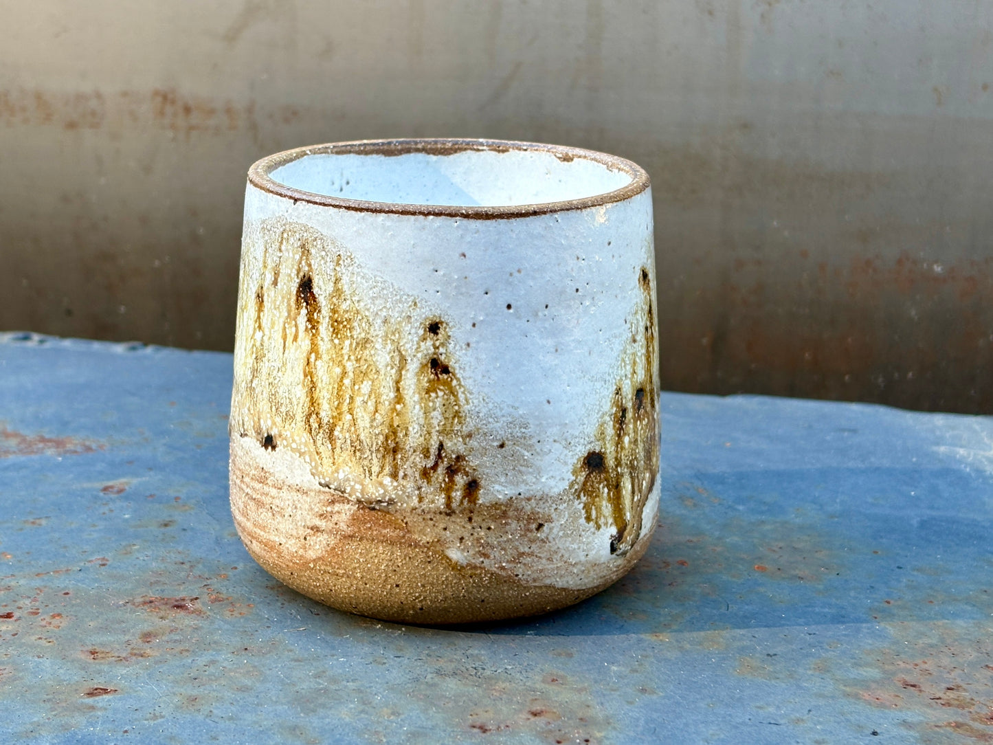 Speckled white cup- raw rim