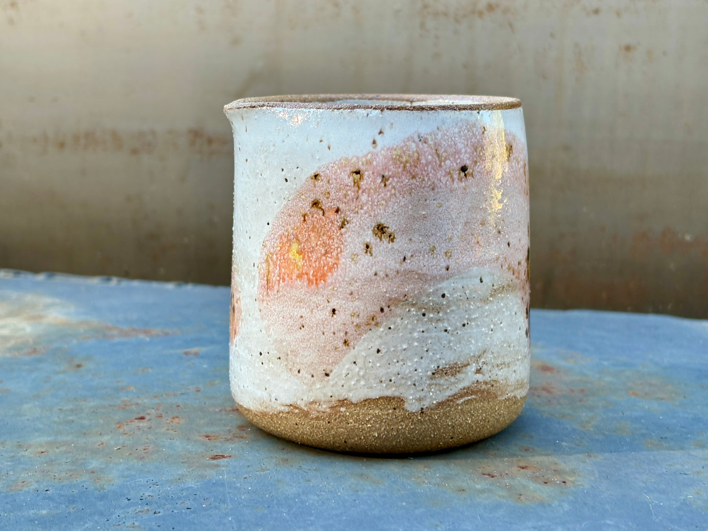 Speckled white creamer- Guava splash and raw rim